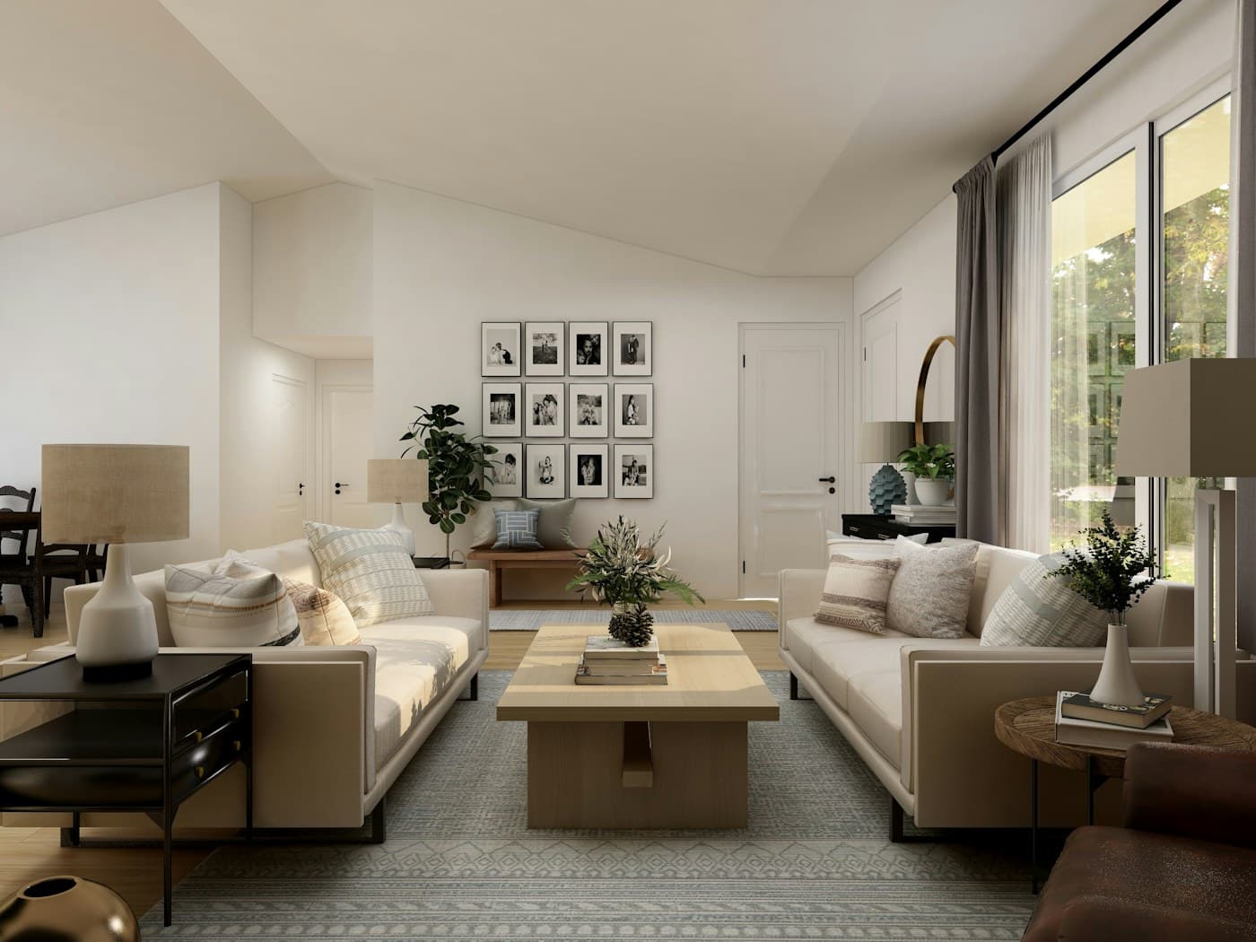 Staged living room with neutral sofa, styled coffee table and warm natural light.